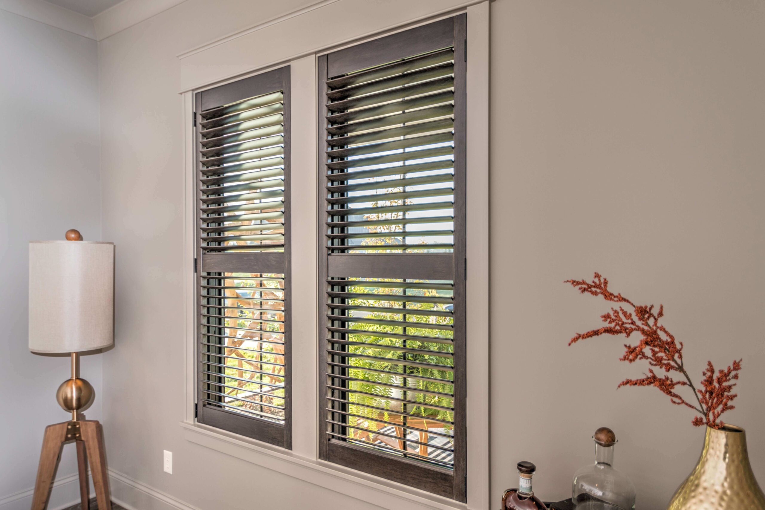 Hunter Douglas Heritance® hardwood shutters in espresso mounted inside the window