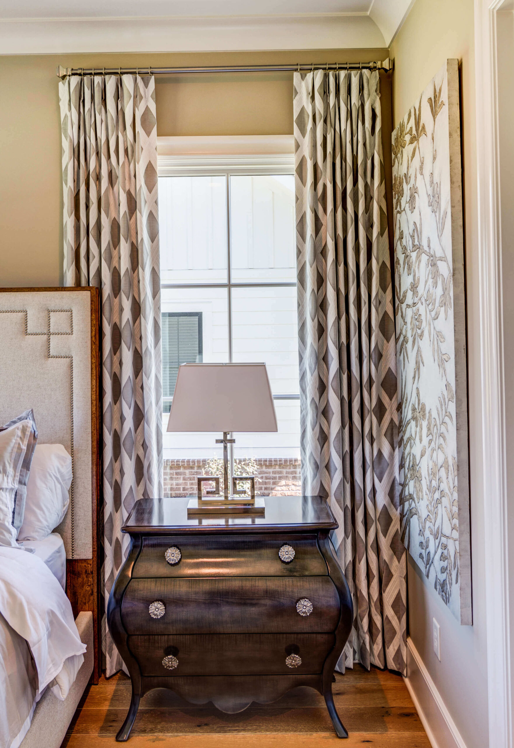 Use drapes to make narrow windows appear larger