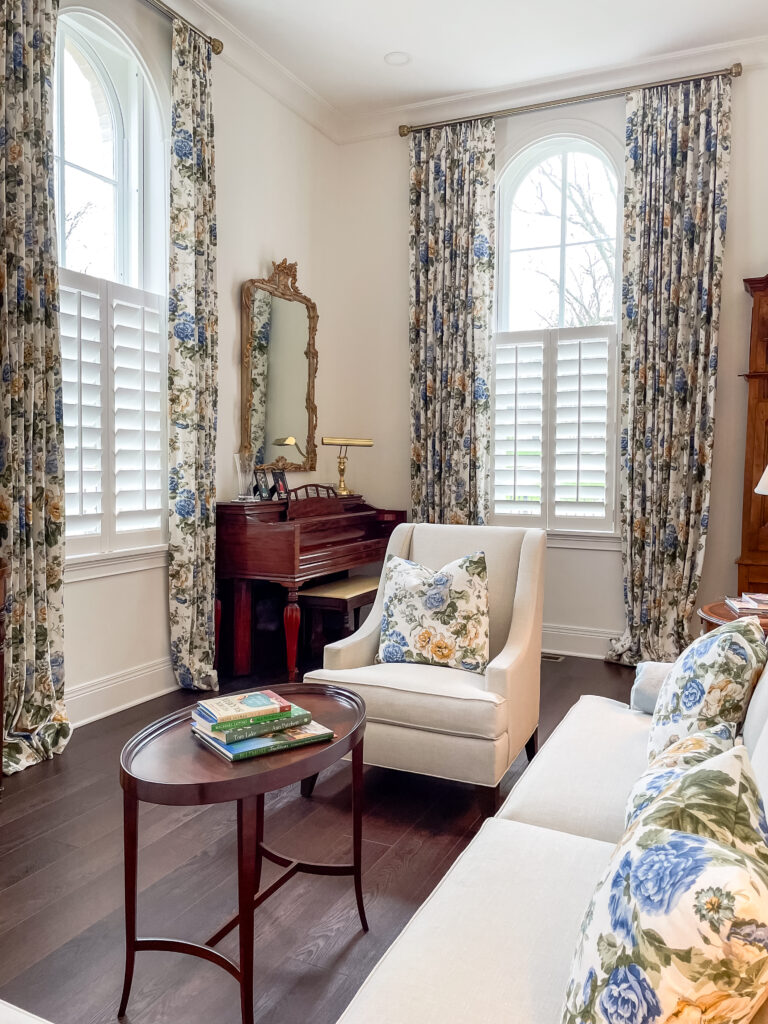 Dramatic floral drapes and half shutters